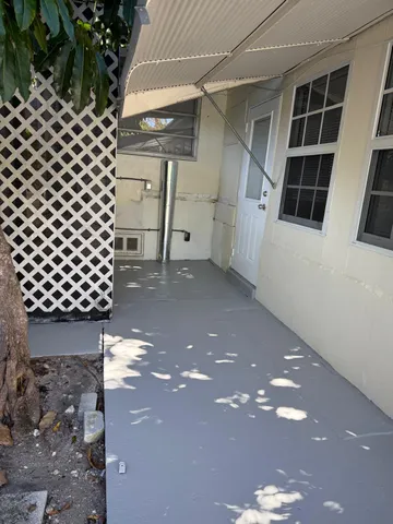 a view of a house with a street