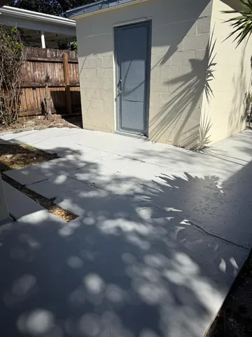 a view of a house with a street