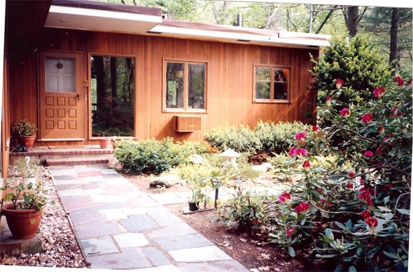75 Woodside Road Harvard, MA 01451 - Photo 1 of 30 a front view of a house with a yard