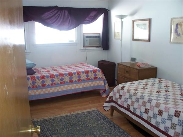 75 Woodside Road Harvard, MA 01451 - Photo 11 of 30 a bedroom with two beds and a window
