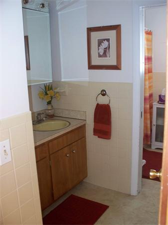 75 Woodside Road Harvard, MA 01451 - Photo 12 of 30 a bathroom with a sink and a mirror