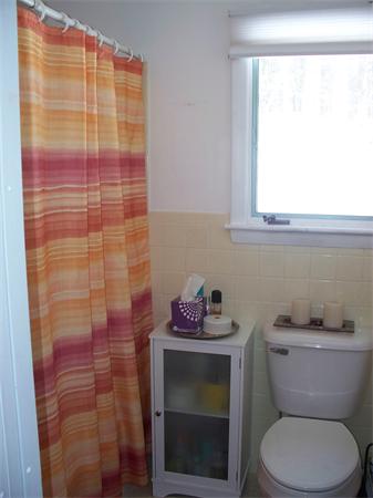 75 Woodside Road Harvard, MA 01451 - Photo 13 of 30 a bathroom with a toilet sink and window