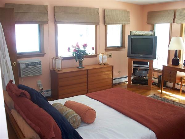 75 Woodside Road Harvard, MA 01451 - Photo 14 of 30 a bedroom with a bed and furniture