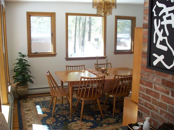 75 Woodside Road Harvard, MA 01451 - Photo 20 of 30 a view of a dining room with furniture and chandelier