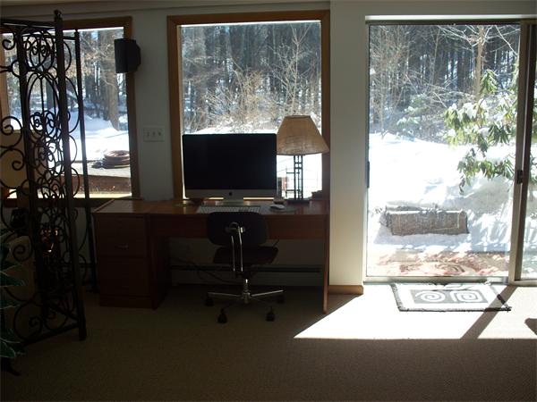 75 Woodside Road Harvard, MA 01451 - Photo 28 of 30 a living room with a large window and a flat screen tv