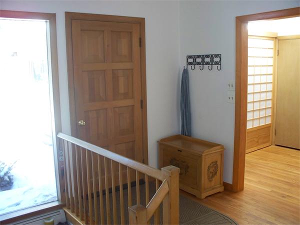 75 Woodside Road Harvard, MA 01451 - Photo 7 of 30 a view of a hallway with wooden floor and entryway