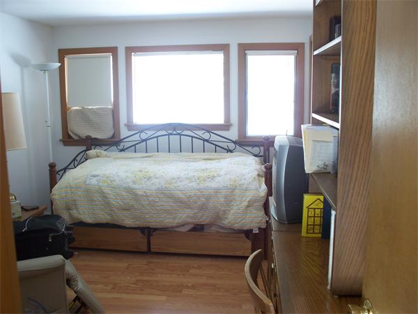 75 Woodside Road Harvard, MA 01451 - Photo 10 of 30 a bed sitting in a bedroom next to a window
