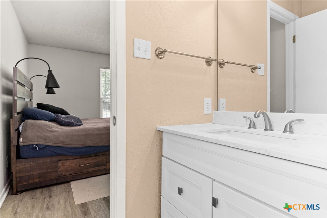 4117 Antelope Trail Temple, TX 76504 - Photo 20 of 30 a bathroom with a sink and a mirror