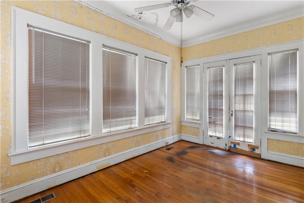 1080 East Clifton Road Northeast Atlanta, GA 30307 - Photo 11 of 29 a view of an empty room with a window