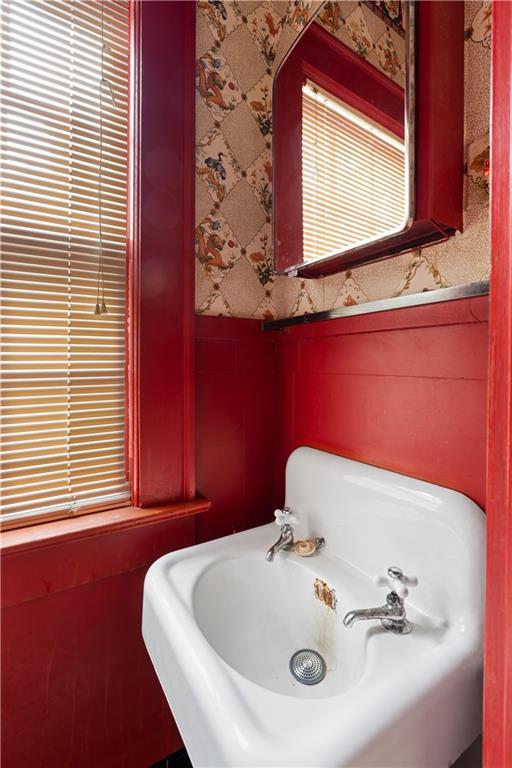 1080 East Clifton Road Northeast Atlanta, GA 30307 - Photo 15 of 29 a bathroom with a sink and a mirror