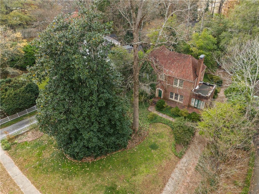 1080 East Clifton Road Northeast Atlanta, GA 30307 - Photo 2 of 29 a aerial view of a house with a yard
