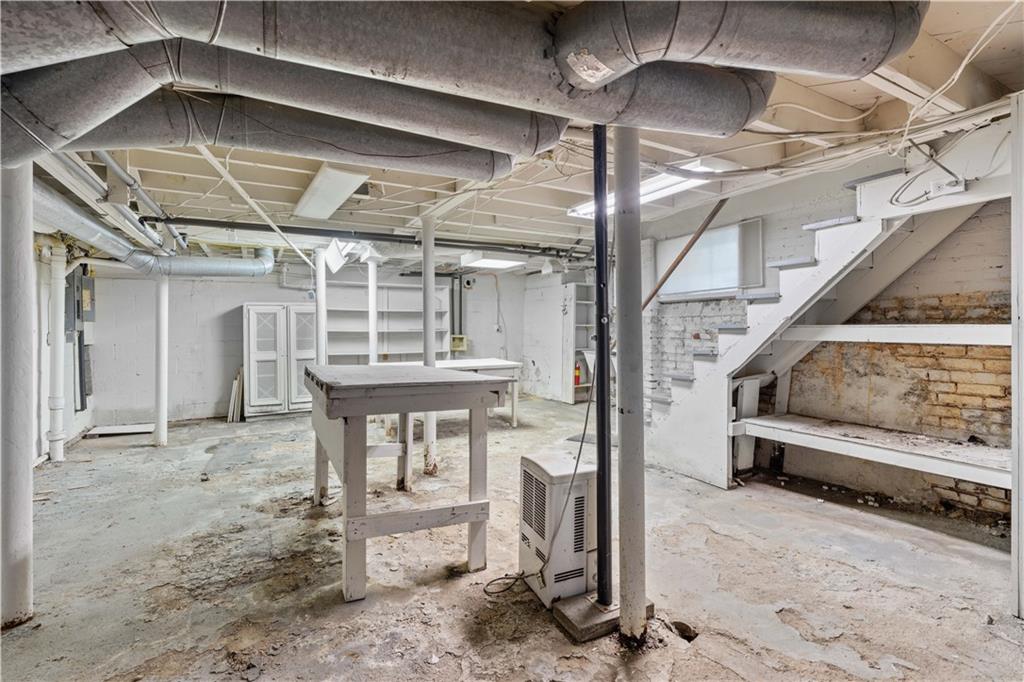 1080 East Clifton Road Northeast Atlanta, GA 30307 - Photo 26 of 29 a view of an empty room with wooden floor