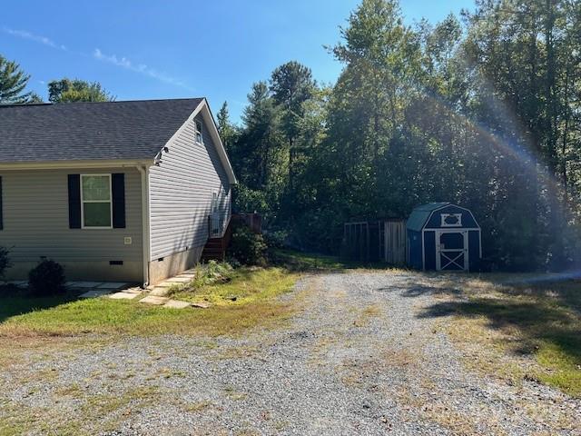 4832 Windy Ridge Road, Unit 2 Morganton, NC 28655 - Photo 40 of 41 a view of a house with a yard