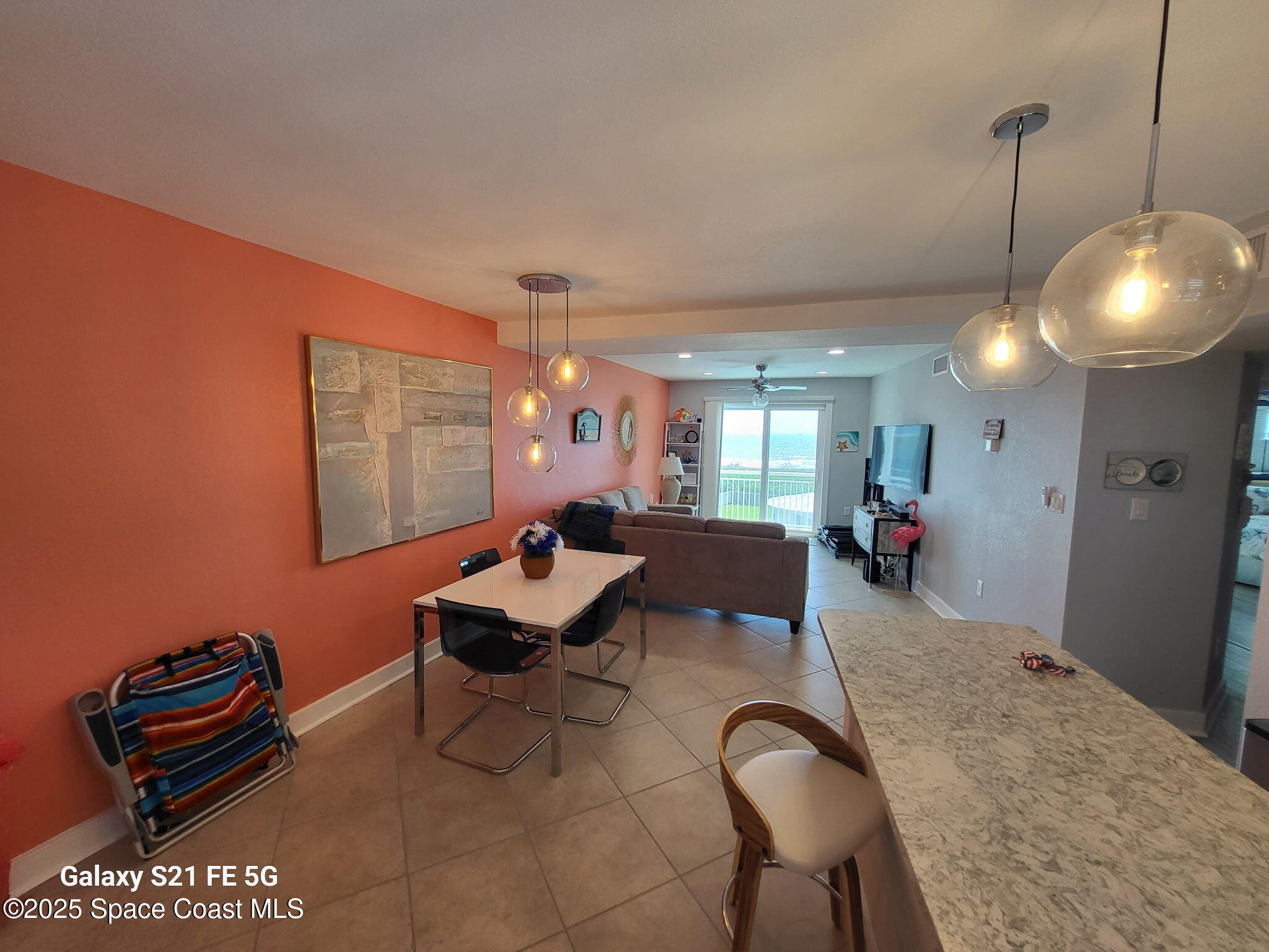 4000 Ocean Beach Boulevard, Unit 4F Cocoa Beach, FL 32931 - Photo 5 of 12 a lobby with furniture and a rug