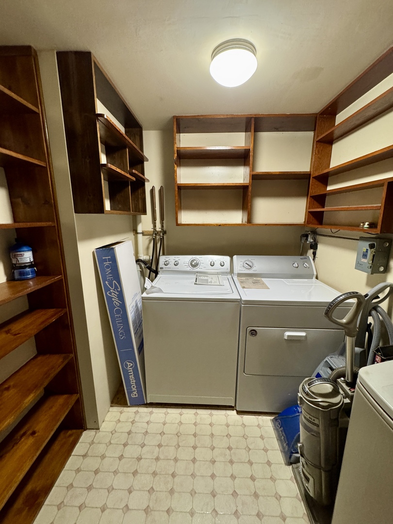 321 East North Street Sheffield, IL 61361 - Photo 14 of 26 a view of storage and utility room with racks on the wall