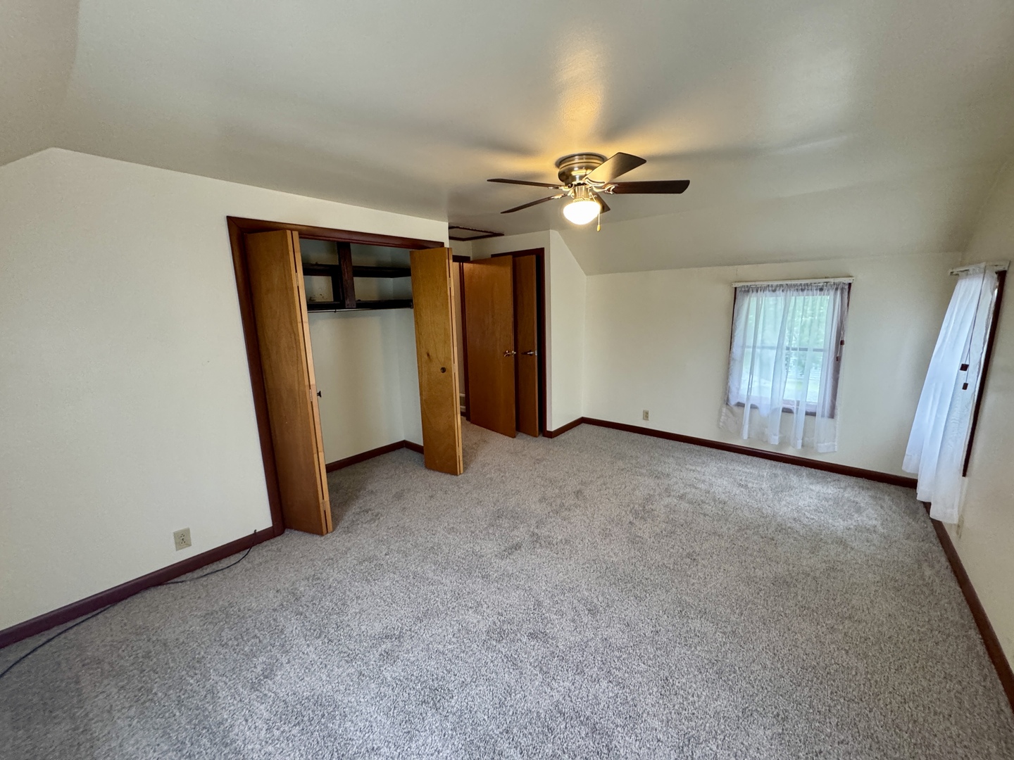 321 East North Street Sheffield, IL 61361 - Photo 17 of 26 an empty room with windows and fan