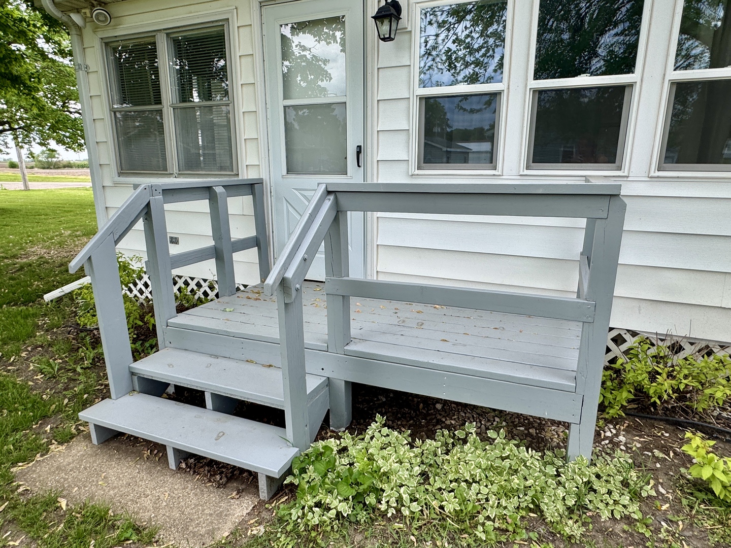 321 East North Street Sheffield, IL 61361 - Photo 22 of 26 a view of backyard with deck and garden