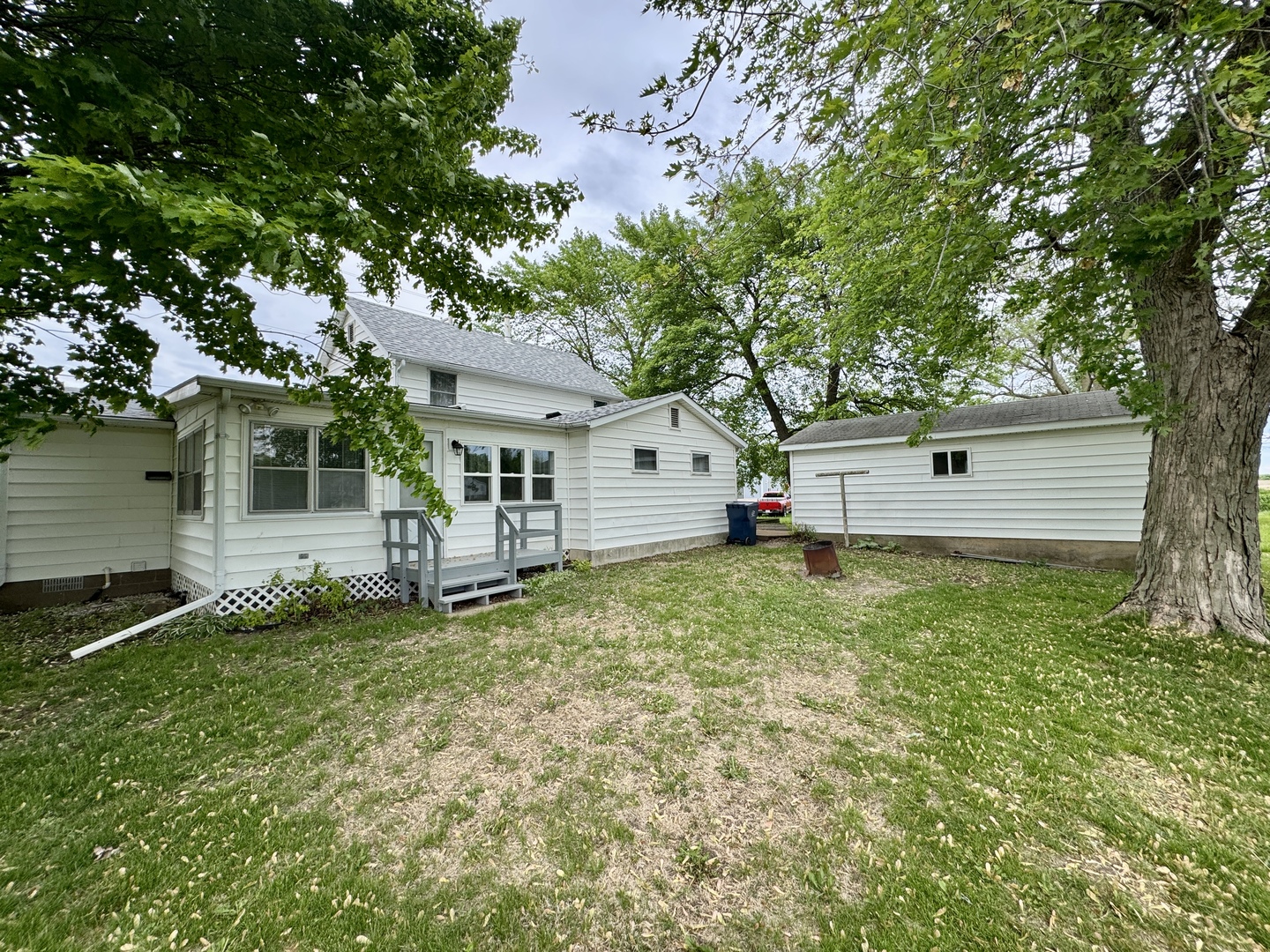 321 East North Street Sheffield, IL 61361 - Photo 23 of 26 a view of a house with a backyard