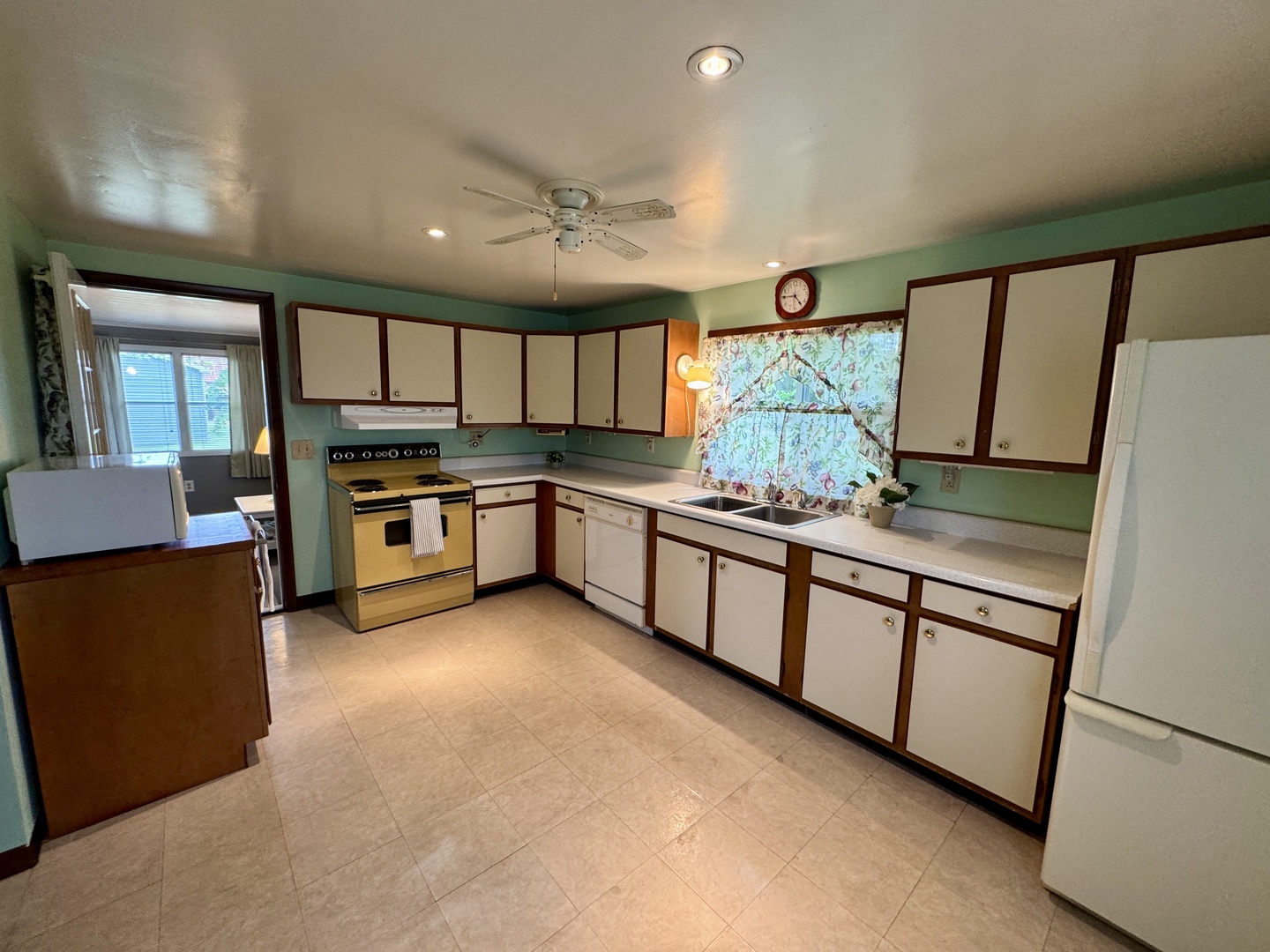 321 East North Street Sheffield, IL 61361 - Photo 6 of 26 a kitchen with stainless steel appliances granite countertop a stove sink and cabinets