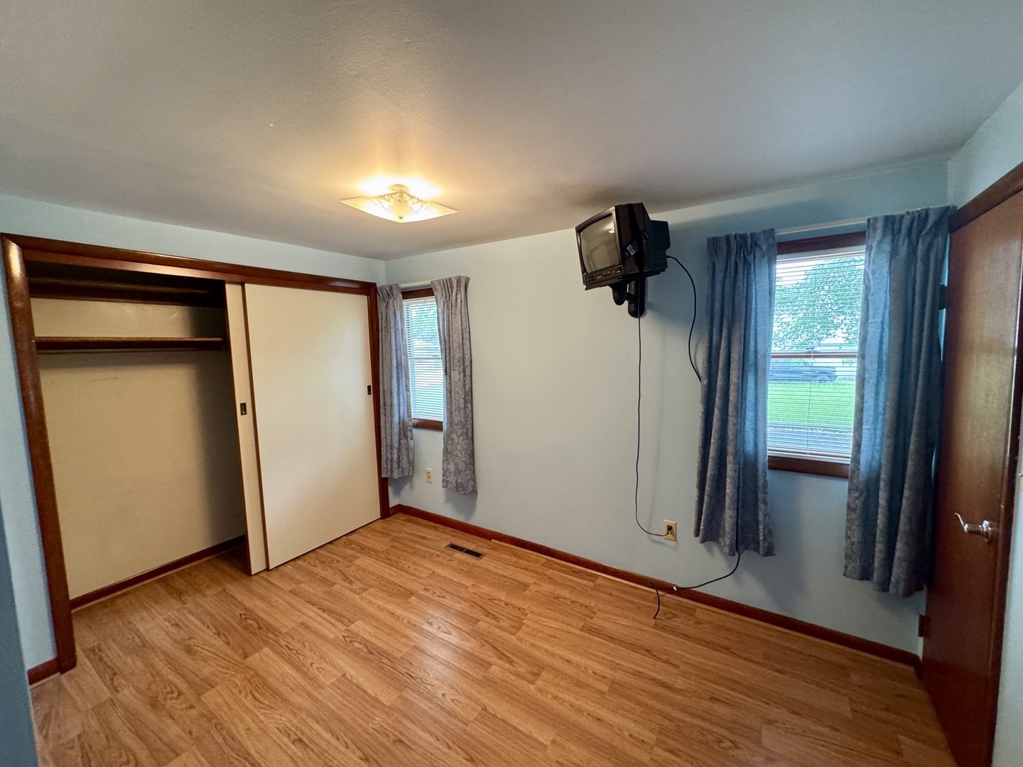 321 East North Street Sheffield, IL 61361 - Photo 10 of 26 wooden floor in an empty room with a window