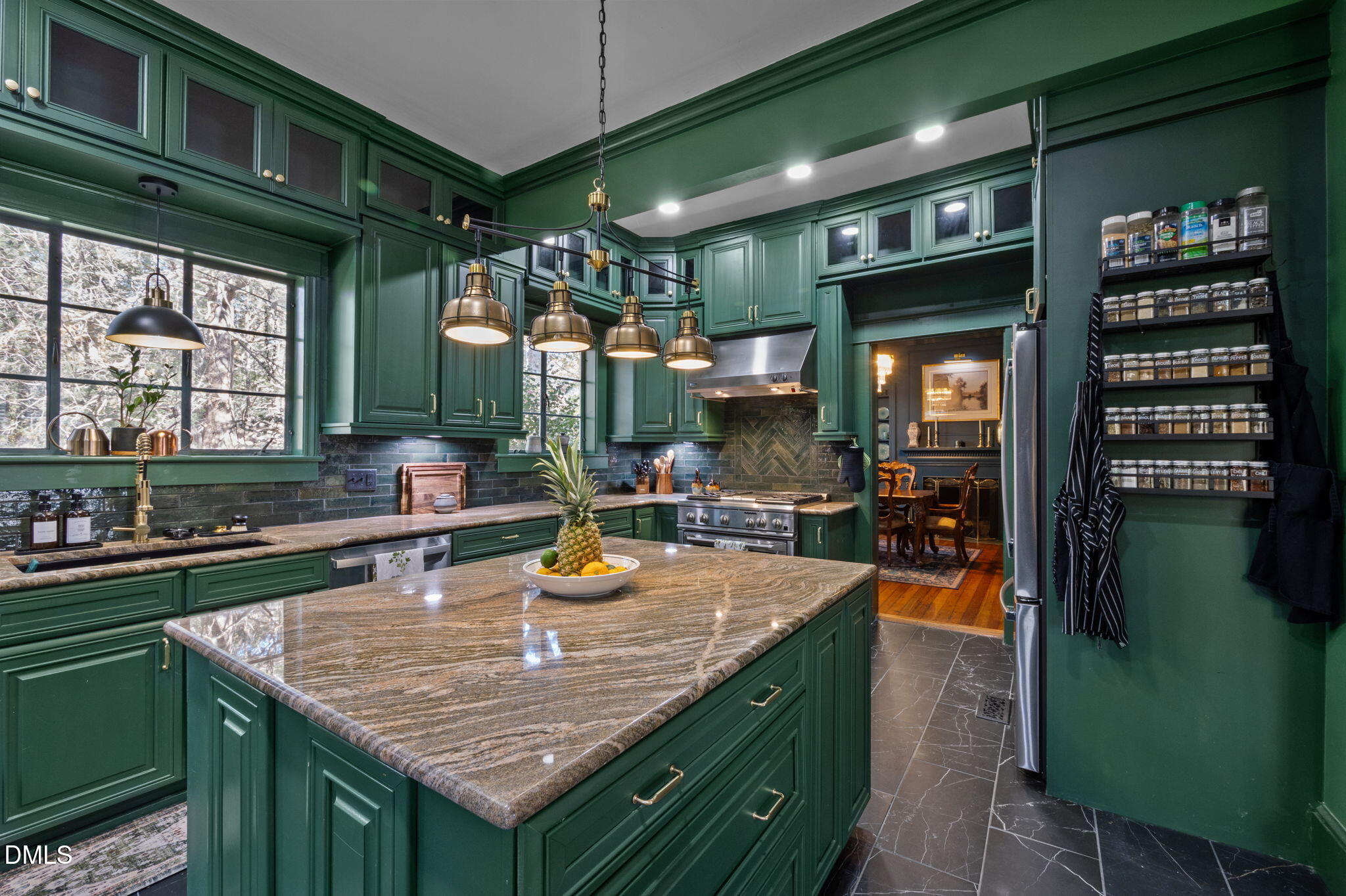 7891 Boston Road Roxboro, NC 27574 - Photo 23 of 94 a kitchen with a sink a counter top space and living room view