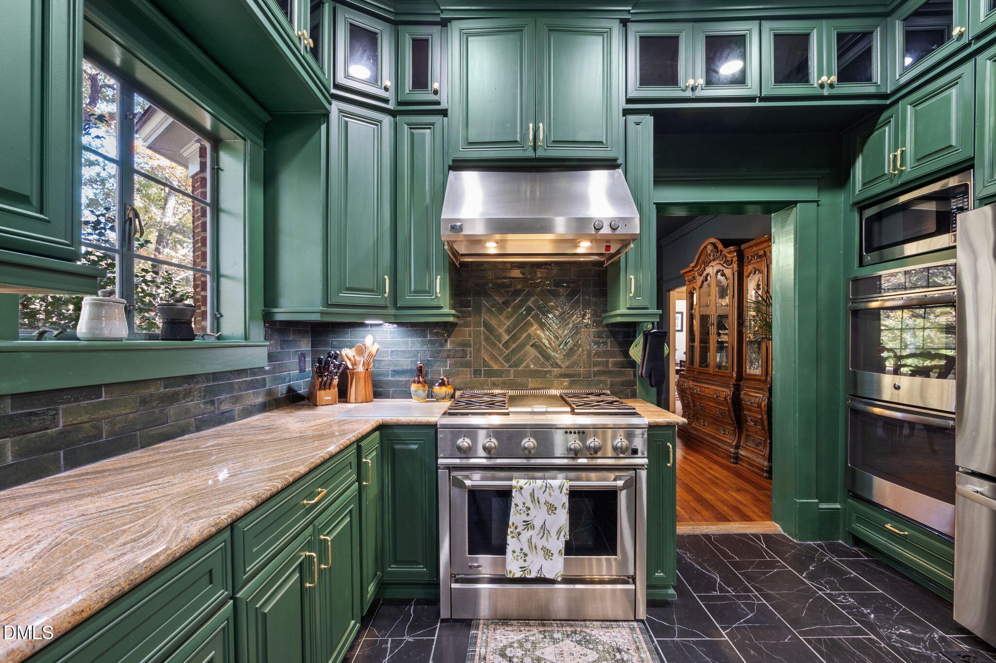 7891 Boston Road Roxboro, NC 27574 - Photo 27 of 94 a kitchen with a stove and cabinets