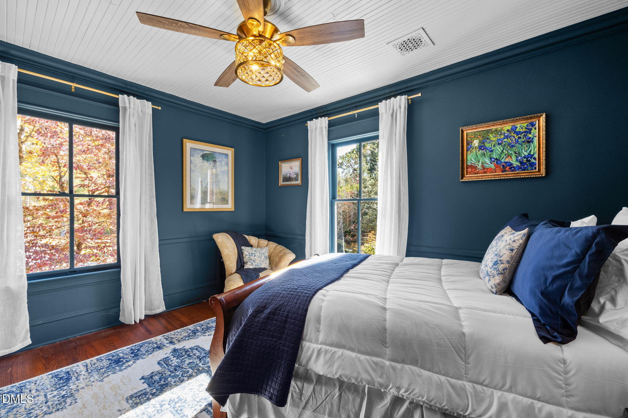 7891 Boston Road Roxboro, NC 27574 - Photo 41 of 94 a bedroom with a bed and wooden floor