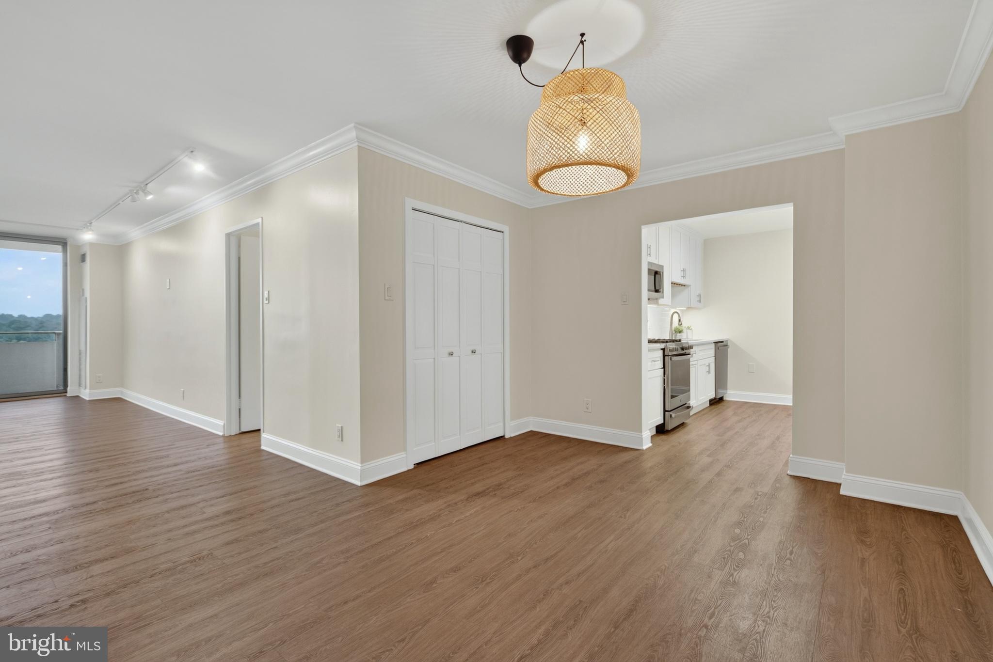 5101 River Road, Unit 1515 Bethesda, MD 20816 - Photo 9 of 33 Dining flows into Living Room