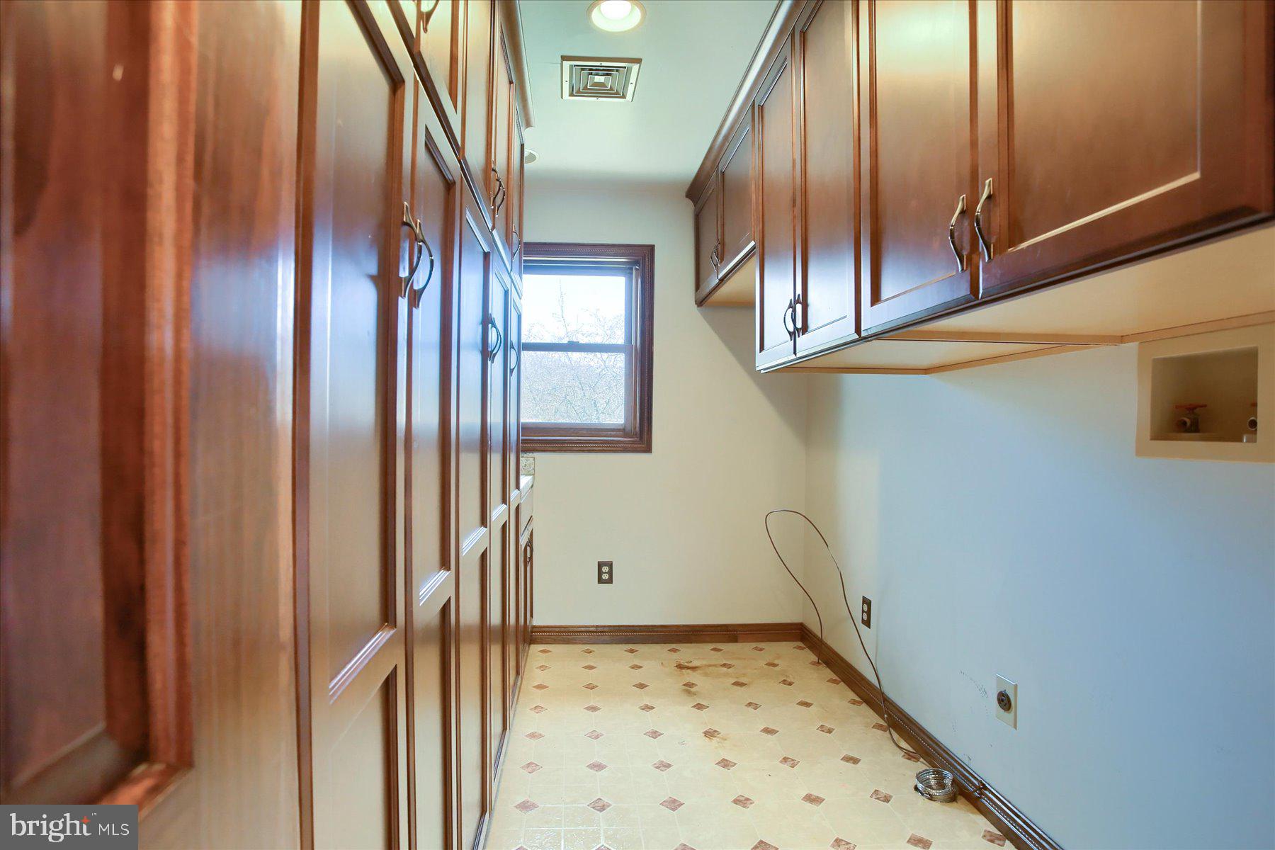 62 Tapeworm Road New Bloomfield, PA 17068 - Photo 14 of 40 Main floor Laundry with space for a refrigerator.