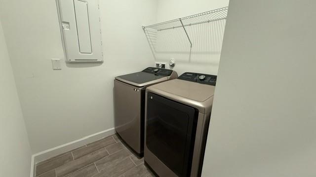 1353 Haywagon Tr. Loxahatchee, FL 33470 - Photo 16 of 34 a utility room with dryer and washer