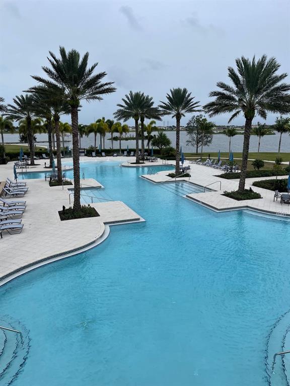 1353 Haywagon Tr. Loxahatchee, FL 33470 - Photo 19 of 34 a view of a lobby with a table and chairs