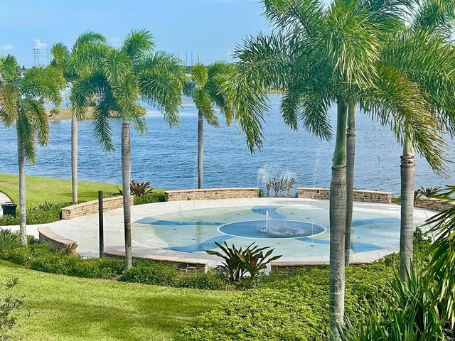 a view of a swimming pool with an ocean view