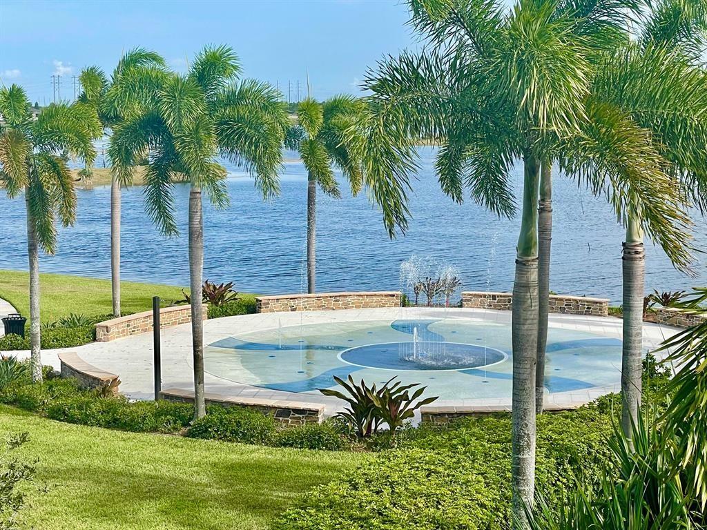 1353 Haywagon Tr. Loxahatchee, FL 33470 - Photo 32 of 34 a view of a yard and patio