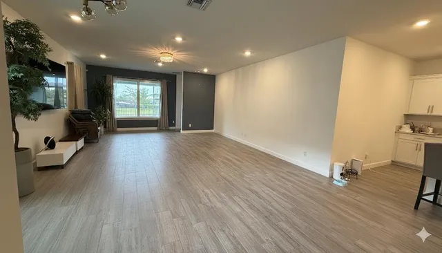 a view of a livingroom with a hardwood