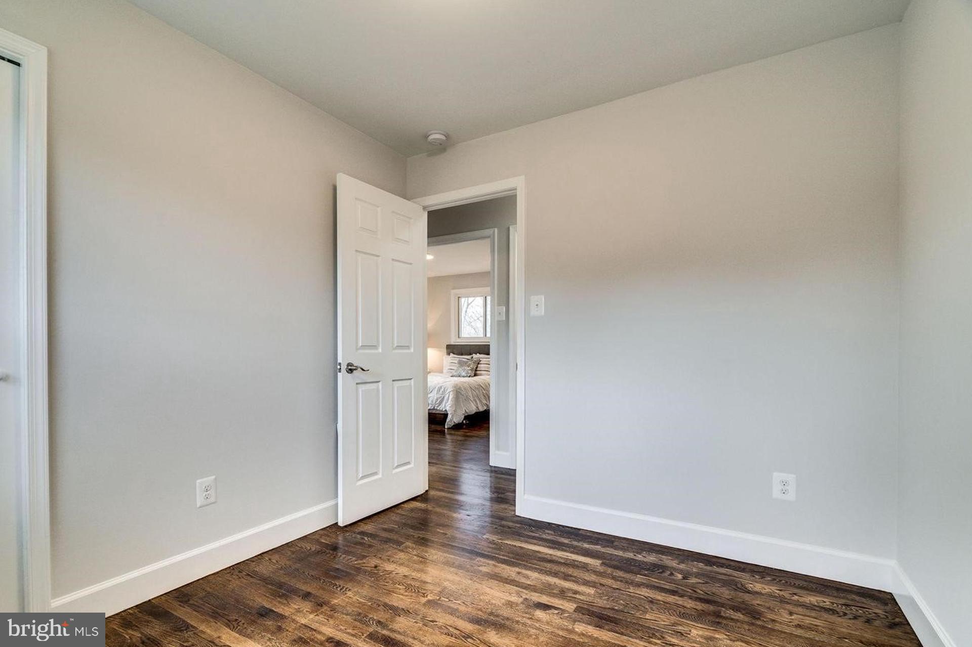 4518 Gage Road Alexandria, VA 22309 - Photo 19 of 42 a view of an empty room and wooden floor