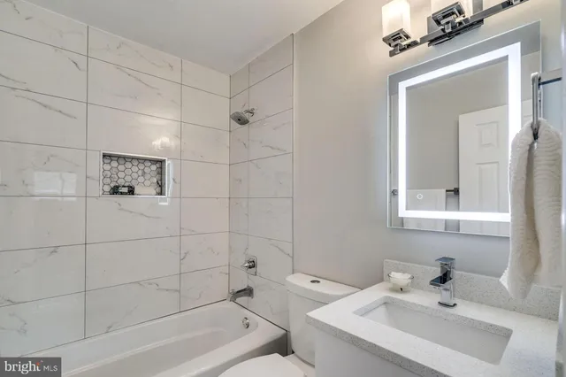 a bathroom with a sink and a bathtub