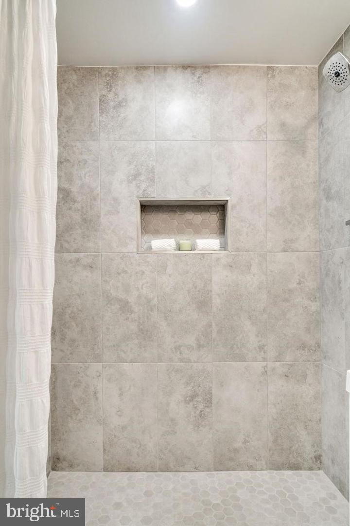 4518 Gage Road Alexandria, VA 22309 - Photo 27 of 42 a bathroom with a shower