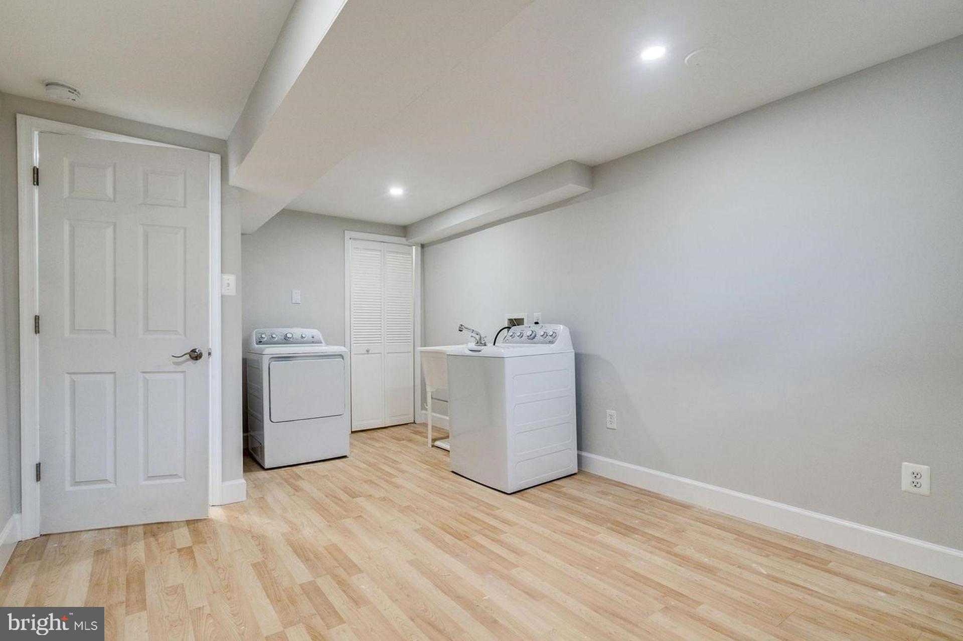 4518 Gage Road Alexandria, VA 22309 - Photo 28 of 42 a view of a storage & utility room with wooden floor