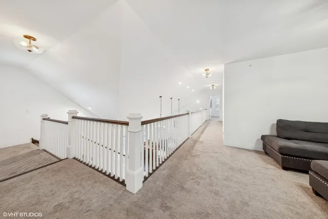 a view of a livingroom with a staircase