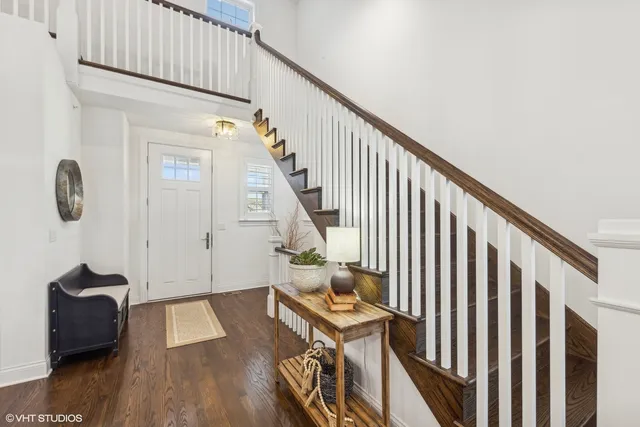 a view of entryway with wooden floor