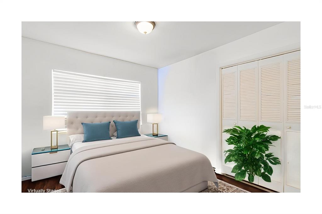 104 Druid Hills Road Temple Terrace, FL 33617 - Photo 11 of 22 a bedroom with a bed plant and a potted plant