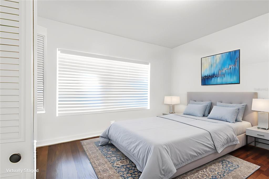 104 Druid Hills Road Temple Terrace, FL 33617 - Photo 12 of 22 a bedroom with a bed and a window