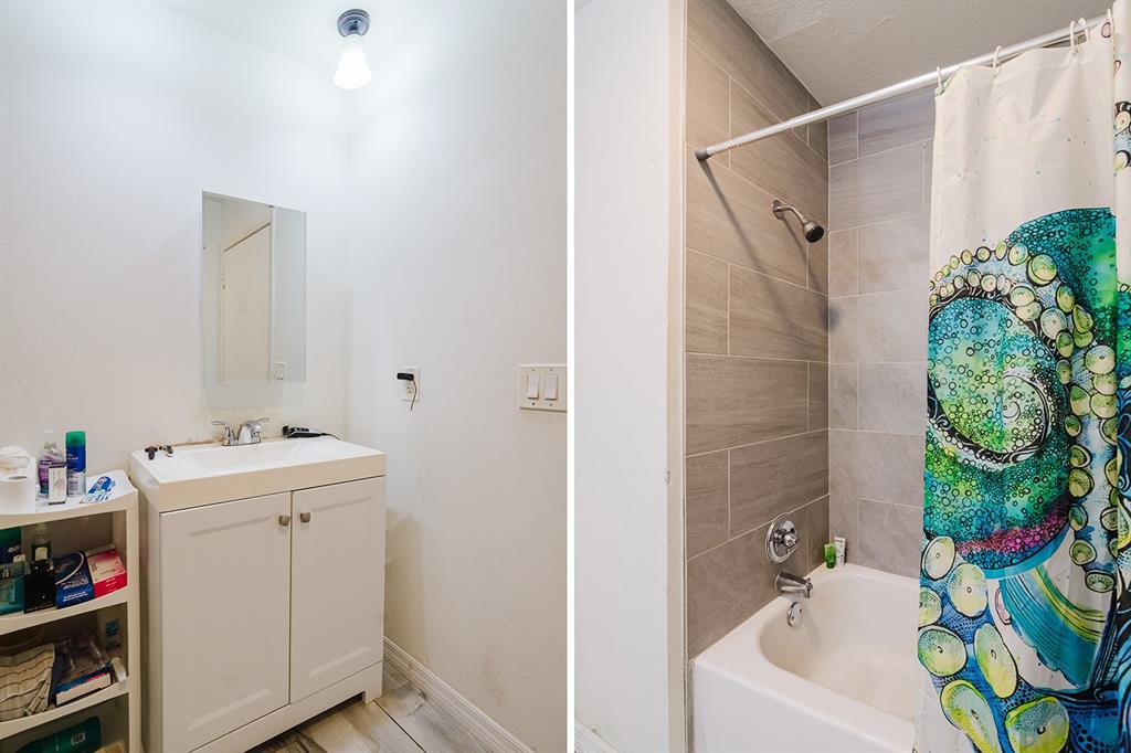 104 Druid Hills Road Temple Terrace, FL 33617 - Photo 13 of 22 a bathroom with a sink and mirror with bathtub