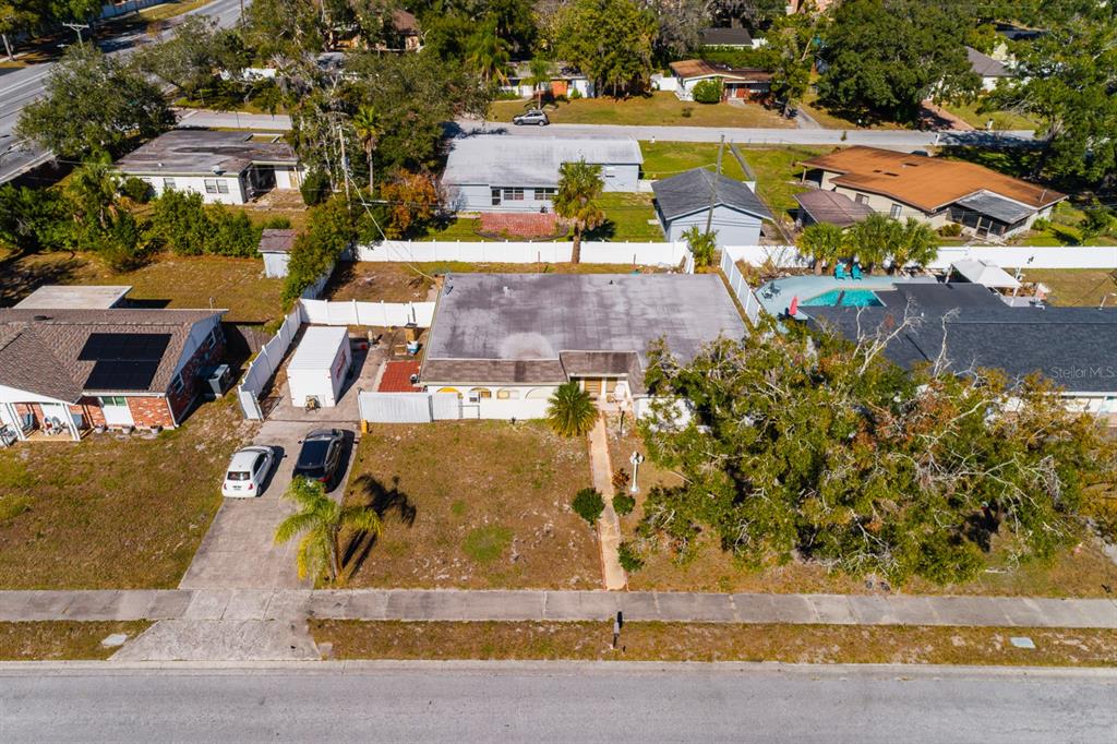 104 Druid Hills Road Temple Terrace, FL 33617 - Photo 20 of 22 an aerial view of residential houses with yard