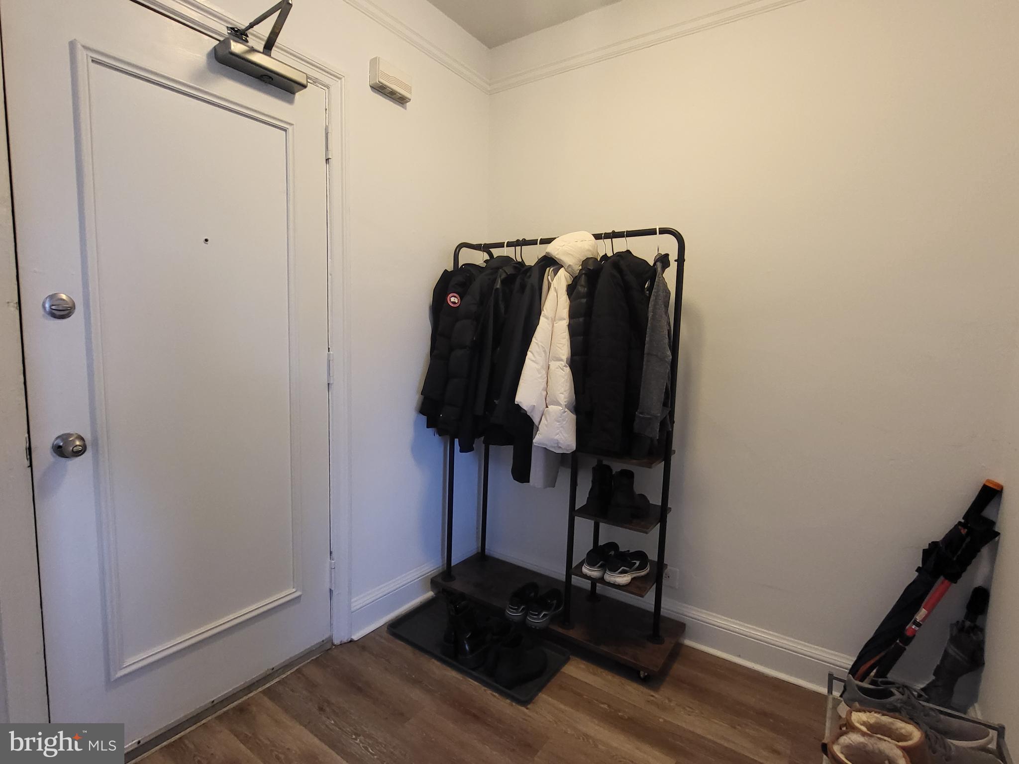 2031 Locust Street, Unit 1503 Philadelphia, PA 19103 - Photo 17 of 24 a view of walk in closet with clothes and shoes