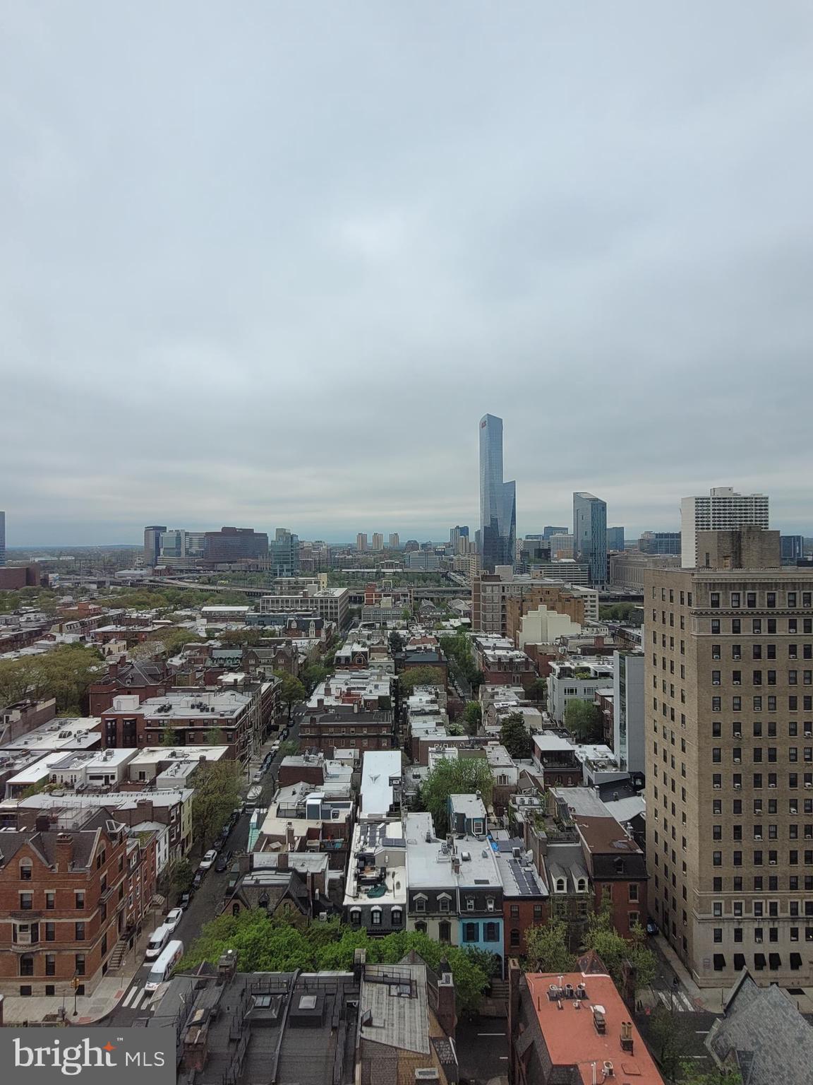 2031 Locust Street, Unit 1503 Philadelphia, PA 19103 - Photo 18 of 24 an aerial view of a city with buildings and ocean view