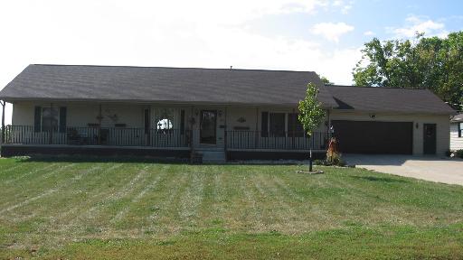 300 West Caroline Street Spring Valley, IL 61362 - Photo 1 of 1 a front view of a house with a yard