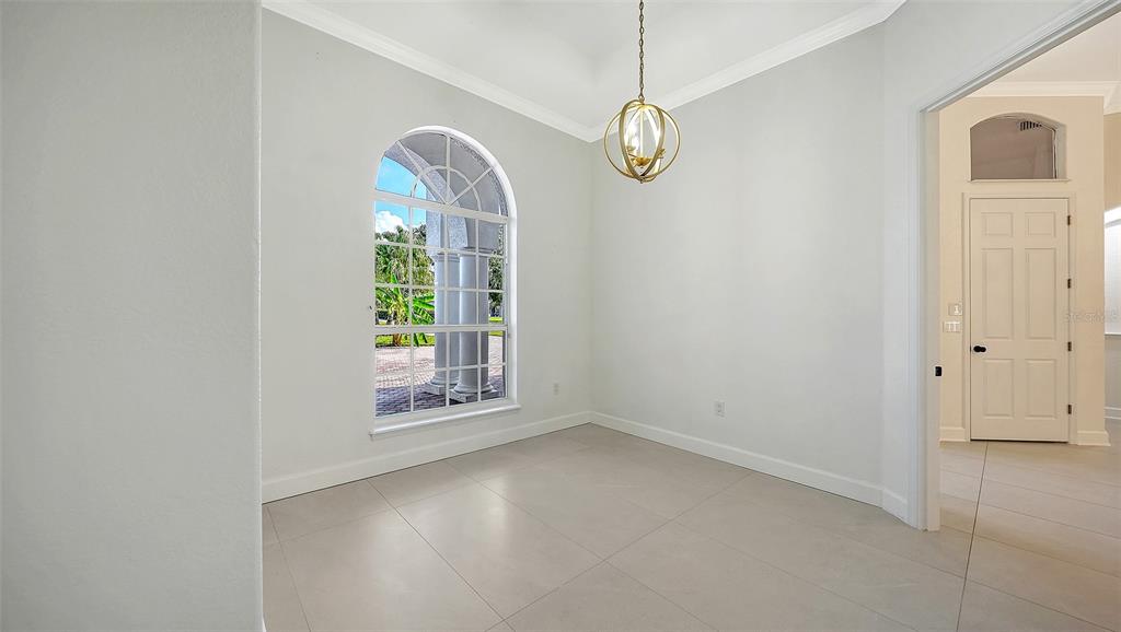 3415 162nd Avenue East Parrish, FL 34219 - Photo 20 of 49 an empty room with windows and fan