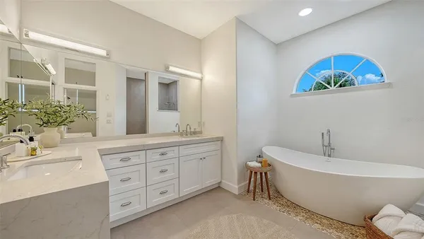 a bathroom with a sink and a bathtub