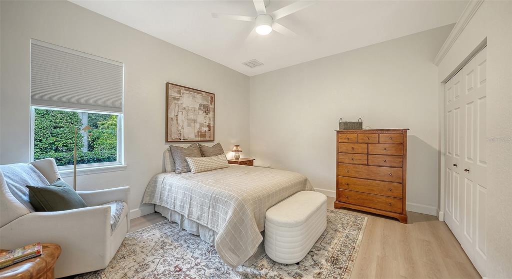 3415 162nd Avenue East Parrish, FL 34219 - Photo 35 of 49 a bedroom with a bed and a window